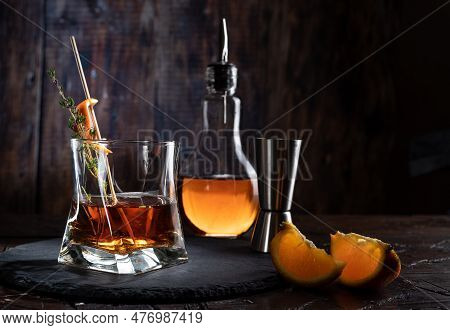 A Glass Of Whiskey And Bartending Accessories. Bar Still Life.