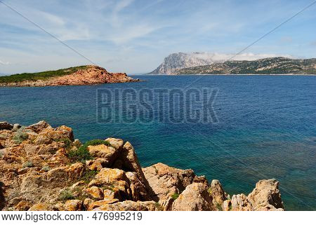 The Coast Of Capo Coda Di Cavallo, In Background The Island Of Tavolara