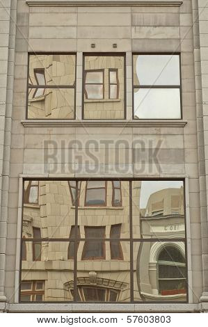 Heritage Building Reflection On Window