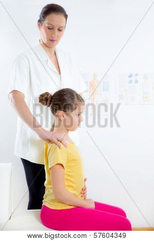 Femile Chiropractor doing adjustment on female patient