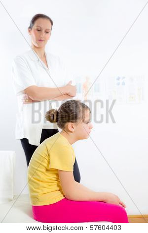 Femile Chiropractor doing adjustment on female patient