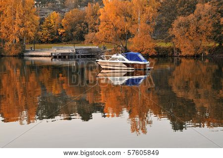 Boat in swedish lake at autumn