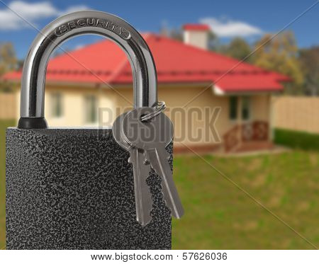 Padlock With House On Background, Protection Of Housing Concept