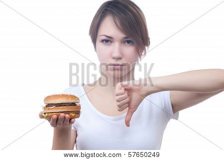 Portrait of girl with humburger showing thumb down