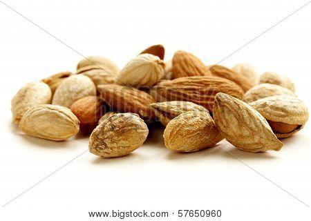 pile of peeled and inshell almonds - delicious and healthy nuts