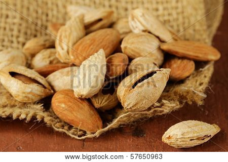 pile of peeled and inshell almonds - delicious and healthy nuts