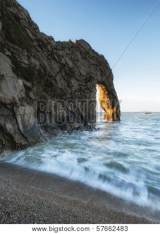 Winter Landscape Sunrise rock stack over ocean