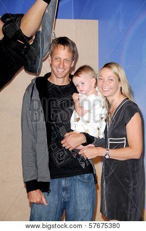 Tony Hawk with Lhotse Merriam and their daughter Kadence at the Unveiling of Madame Tussauds Wax Figure of Tony Hawk. Madame Tussauds Wax Museum, Hollywood, CA. 07-29-09
