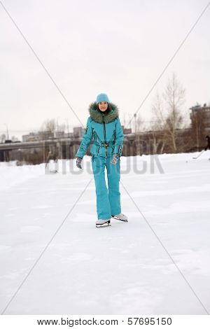 Young Girl Skating On The Frozen Lake