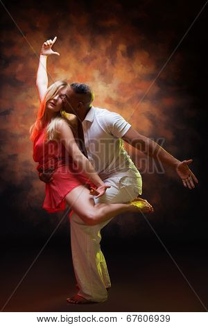 Young couple dances Caribbean Salsa