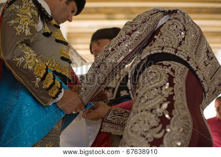 Bullfighter Getting Dressed
