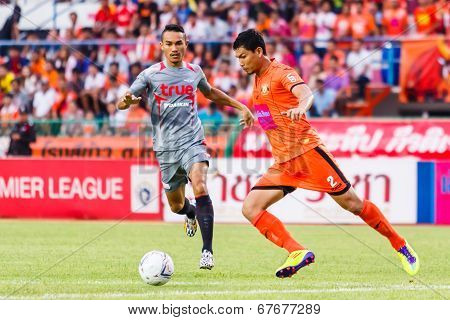 Sisaket Thailand-june 29: Chatchai Mokkasem Of Sisaket Fc. (orange) In Action During Thai Premier Le