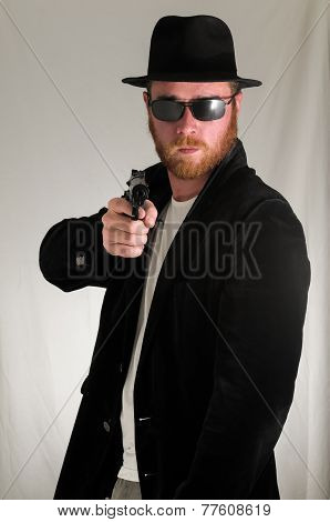 Man Holding a Pistol Gun