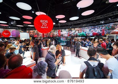 COLOGNE, GERMANY - SEPTEMBER 19, 2014: Canon stand in the Photokina Exhibition. The Photokina is the world's largest trade fair for the photographic and imaging industries