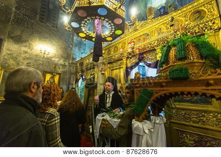 ATHENS, GREECE - APR 10, 2015: Unidentified people during the celebration of Orthodox Easter - Vespers on Great Friday (the Epitaphios in Greek served in Good Friday evening). 