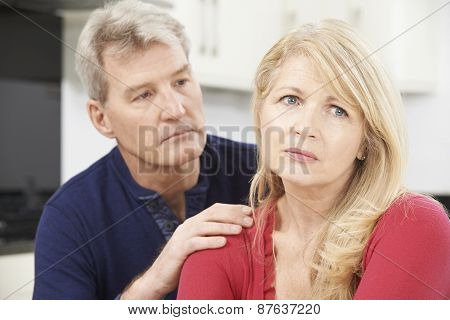 Mature Man Comforting Woman With Depression