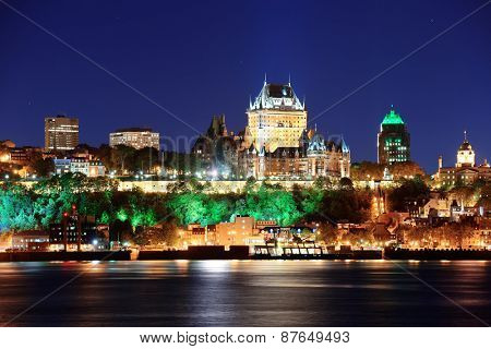Quebec City skyline at dusk over river viewed from Levis.