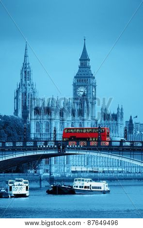 Big Ben, House of Parliament and Lambeth Bridge with red bus in London.