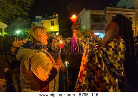 ATHENS, GREECE - APR 10, 2015: Unidentified people during the celebration of Orthodox Easter - Vespers on Great Friday (the Epitaphios in Greek served in Good Friday evening). 