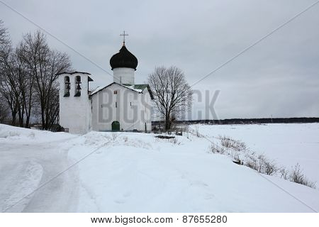 Russian winter. Church of Saint Elijah the Prophet at the Vybuty Pogost near Pskov, Russia.