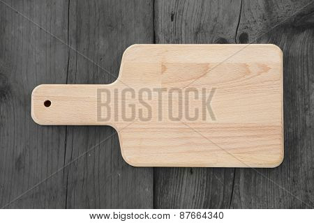 Empty Cutting Board On Dark Wooden Planks