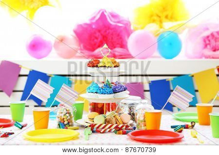 Prepared birthday table with sweets for children party