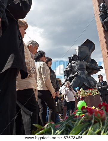 UFA,RUSSIA - MAY 9.  Flowers and people near Memorial to the Heroes of the Soviet Union Alexander Ma