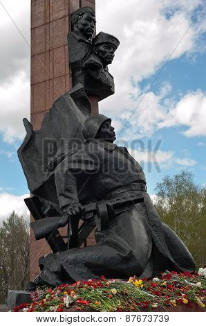 Flowers near Memorial to the Heroes of the Soviet Union Alexander Matrosov and M. Gubaidullin. World