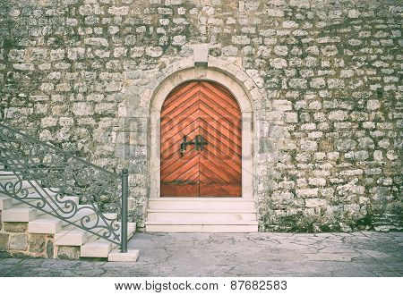 Ancient Entrance To The Historical Building Of The Citadel In The Old Town Of Budva, Montenegro. Hea