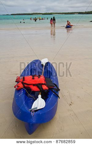 Unidentified tourists kayaking in Garraptero beach, Santa Cruz, Galapagos Islands