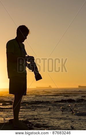 Silhouetted Travel Photographer