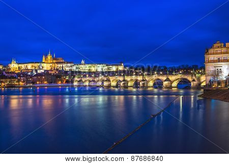 Evening View Of The Prague Castle, Charles Bridge And The Vltava