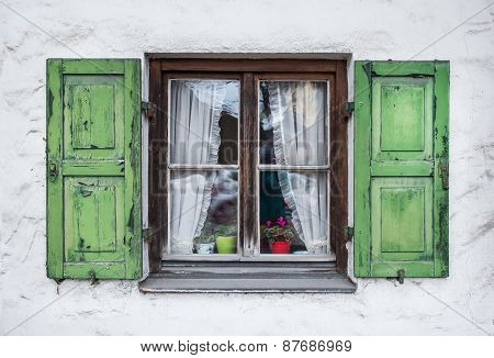 Authentic Window With Green Wooden Shuttters In A Small Town Of