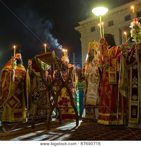 ATHENS, GREECE - APR 12, 2015: Unknown people during celebration of Orthodox Easter (Midnight Office of Pascha) Holy Saturday is often the only time that the Midnight Office will be read in parishes.