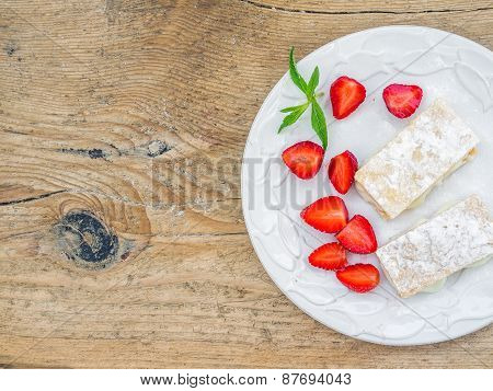 Flacky Pastry On A Wooden Desk