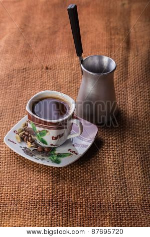 A cup of coffee on the table. Coffee brewed in Arabic