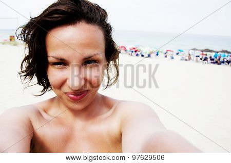 Woman Self Portrait On Beach