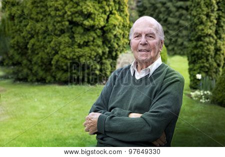 Portrait of 95 years old english man in his garden