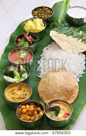 meals served on banana leaf, traditional south indian cuisine