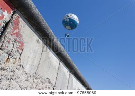 berlin wall, germany , blue sky, hot air balloon