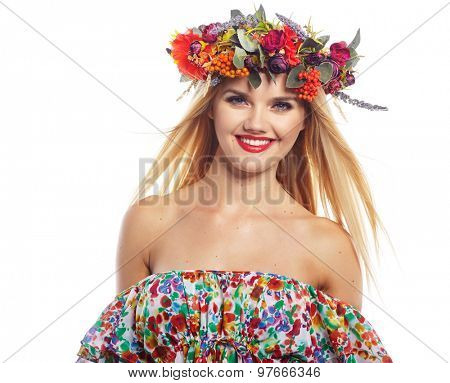 Slavic blonde girl in the flowers wreath