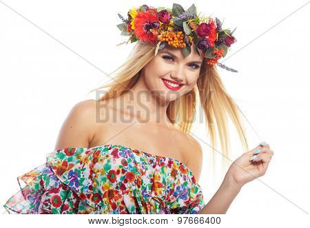 Slavic blonde girl in the flowers wreath