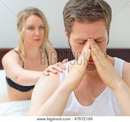 Upset Young Couple Having Problems With Sex.