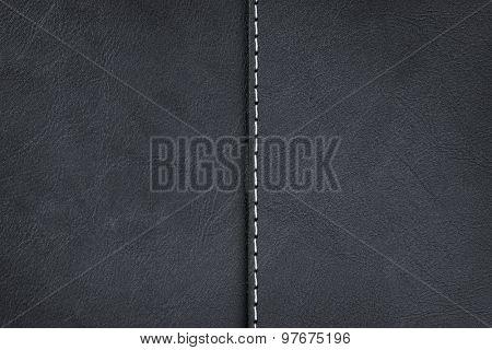 Black leather texture background with seam
