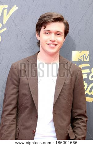 LOS ANGELES - MAY 7:  Nick Robinson at the MTV Movie and Television Awards on the Shrine Auditorium on May 7, 2017 in Los Angeles, CA