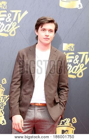 LOS ANGELES - MAY 7:  Nick Robinson at the MTV Movie and Television Awards on the Shrine Auditorium on May 7, 2017 in Los Angeles, CA