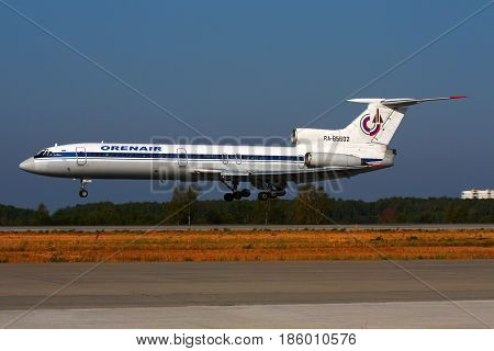 DOMODEDOVO, MOSCOW REGION, RUSSIA - JULY 31 2010: Orenair airlines Tupolev Tu-154B-2 RA-85602 landing at Domodedovo international airport.