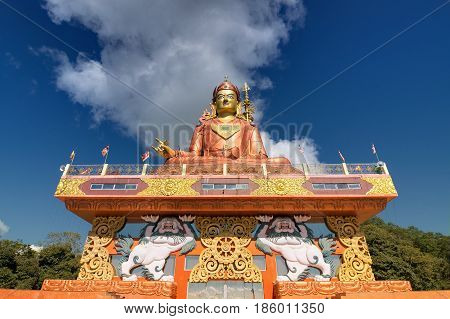 Samdruptse statue a huge buddhist memorial statue in Sikkim blue cloudy sky in background. It is a fourite tourist spot in Sikkim.