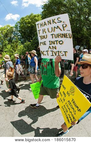 ATLANTA, GA - APRIL 22:  A man holds up a sign that says 