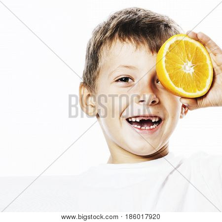 little cute boy with orange fruit double isolated on white smiling without front teeth adorable kid cheerful close up
